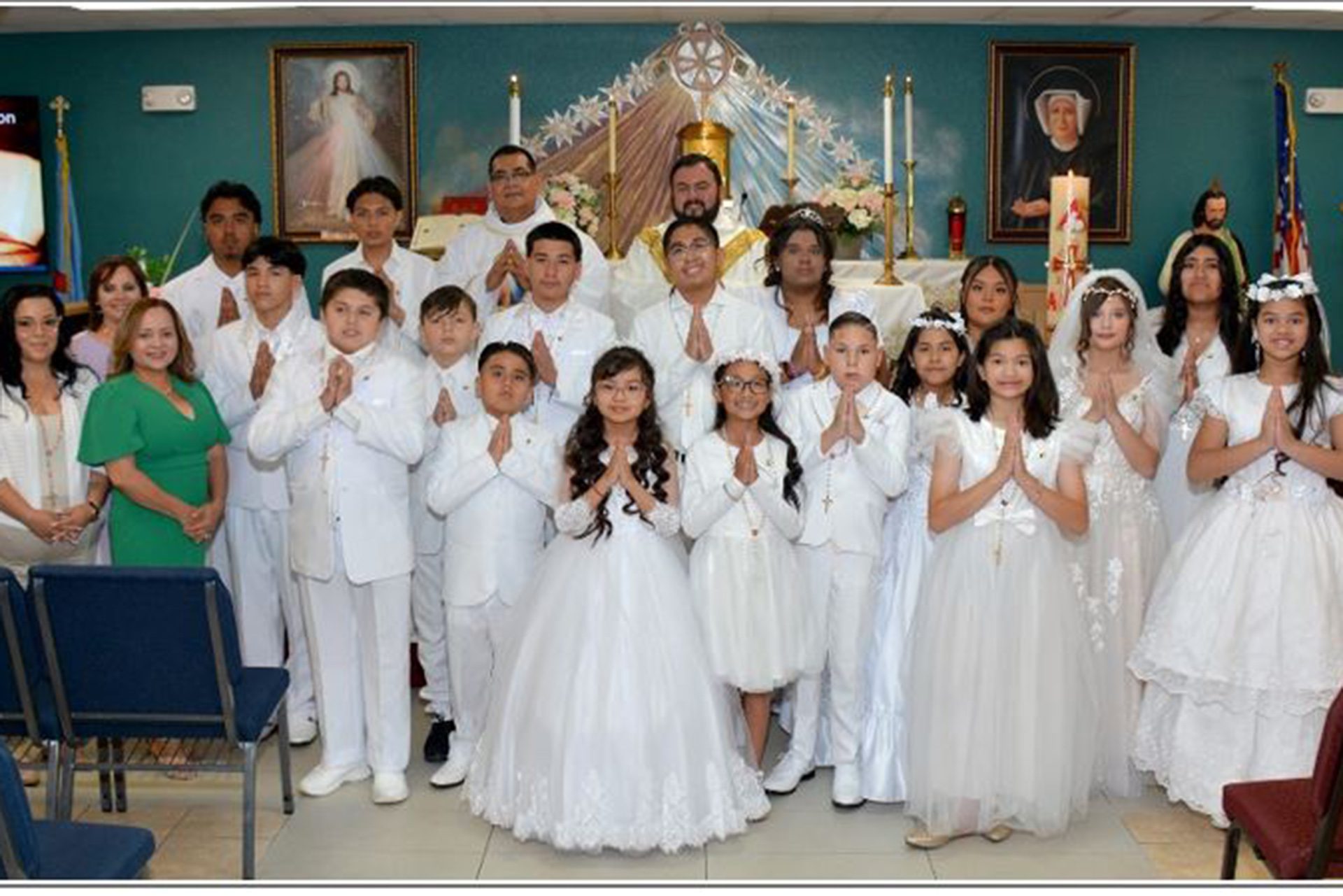 First Communion Picture family holding hands in prayer for peace
